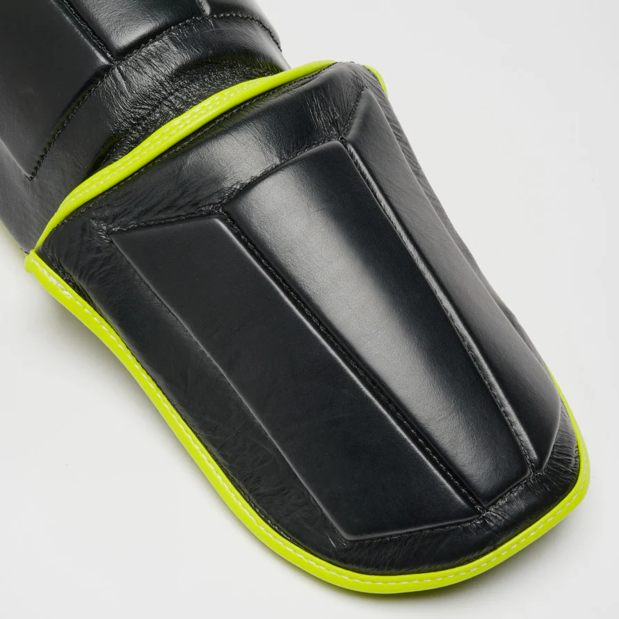 Espinilleras Leone Revo Fluo PT160F con reposapiés  - Image 6
